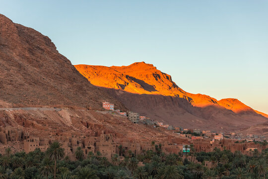 View of the Palmeraie de Tinghir, a valley with palm trees near Ait Ismene village at sunset, Tinghir, Morocco.