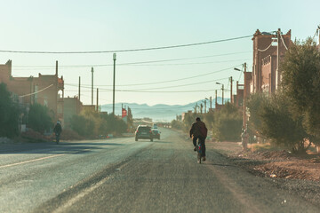 View of a road crossing a village in central Morocco.