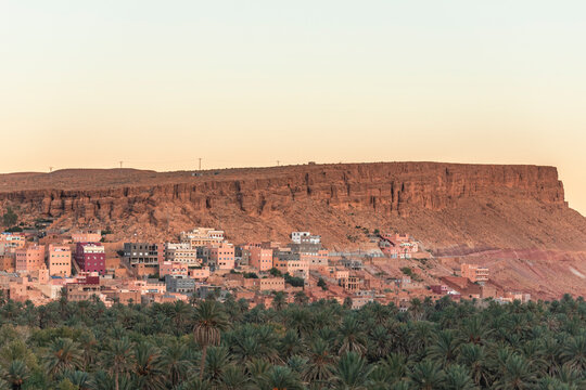 View of the Palmeraie de Tinghir, a valley with palm trees near Ait Ismene village at sunset, Tinghir, Morocco.