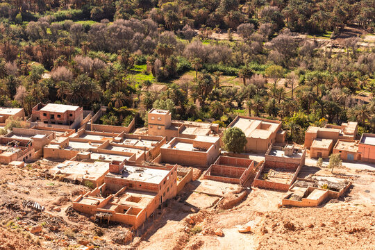 View of berber villages near the Palmeraie, a valley with palm trees along the Ziz Valley with canyon near Errachidia, Morocco.