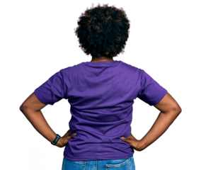 African american woman with afro hair wearing casual purple t shirt standing backwards looking away with arms on body