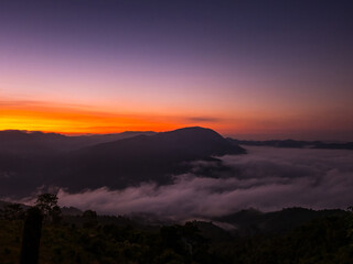 Morning light with the sun rising on the horizon at Baan Thiyaphe, Sop Moei District, Mae Hong Son Province, Thailand