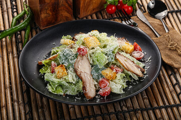 Caesar salad with chicken and romano