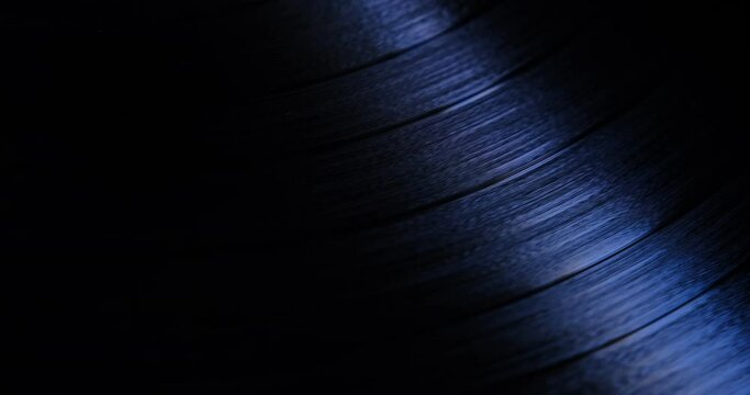 Vinyl record rotating in a macro shot