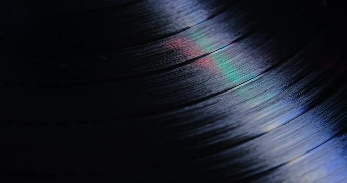 Vinyl record rotating in a macro shot