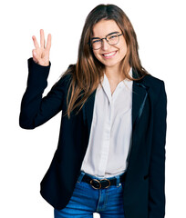 Young caucasian girl wearing business style and glasses showing and pointing up with fingers number three while smiling confident and happy.