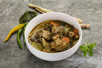 Thai green curry soup with basil