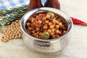 Chickpea beans with dry tomato and olives