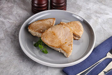 Roasted red tuna steak in the plate