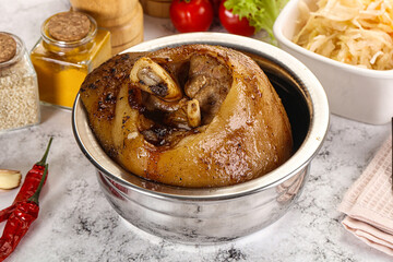 Baked pork knee with spices
