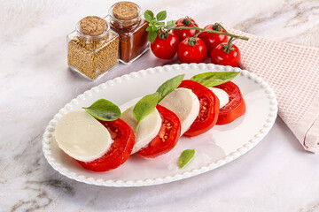 Italian caprese salad with mozzarella