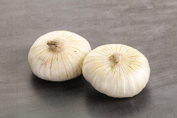 Raw white onion heap isolated
