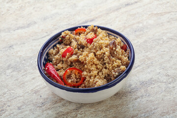 Arabic cous cous with meat and tomato