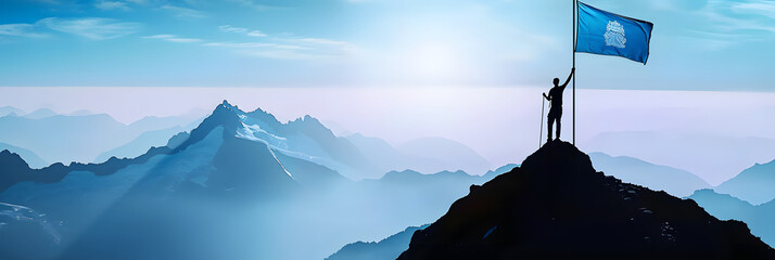 Silhouette of man holding blue flag on top of mountain, achievement and success concept - Powered by Adobe