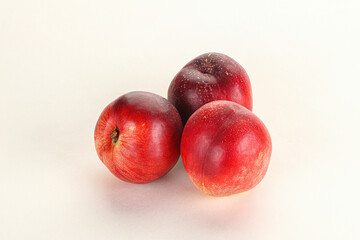Ripe sweet juicy nectarines heap