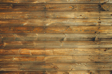 Horizontal shot of a wooden boardwalk, showcasing deep wood grains and knots with a hint of natural...