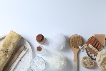 Bath accessories. Flat lay composition with personal care products on white background, space for...