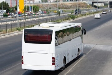 White tourist bus in the highway road. Travel concept.