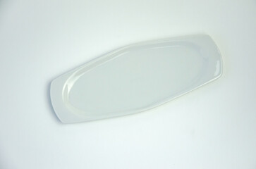 Empty white plate on white background