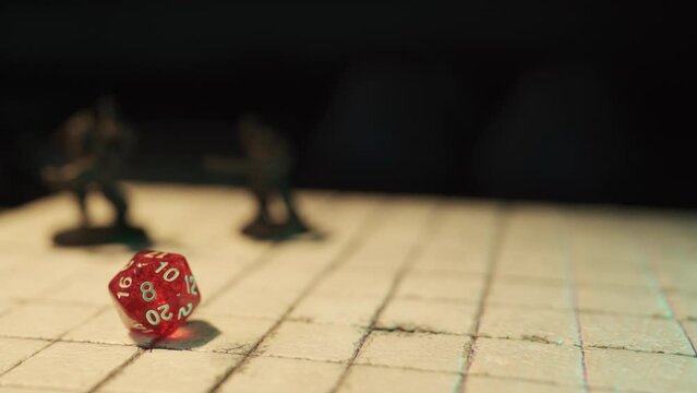 Playing a fantasy tabletop role-playing game with a D20 dice