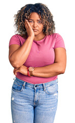 Young african american plus size woman wearing casual clothes thinking looking tired and bored with depression problems with crossed arms.