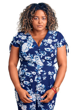 Young african american plus size woman wearing casual clothes depressed and worry for distress, crying angry and afraid. sad expression.