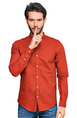 Young hispanic man wearing casual clothes asking to be quiet with finger on lips. silence and secret concept.