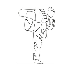 girl doing taekwondo
