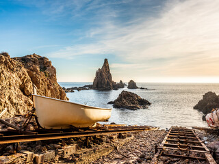 Beautiful Gata Cape landscape with rock formations in the water during sunset in Andalucia, Spain