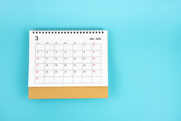 March 2024, Monthly desk calendar for 2024 year on blue background.