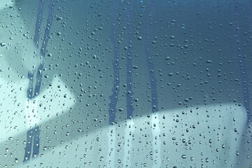 raindrops on window on car windshield