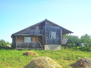 Russia, Ryazan region, wooden house with balcony and veranda
