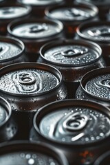 Obraz premium A detailed close-up of a bunch of soda cans. This image can be used for advertising, beverage industry promotions, or as a background for a food and drink blog