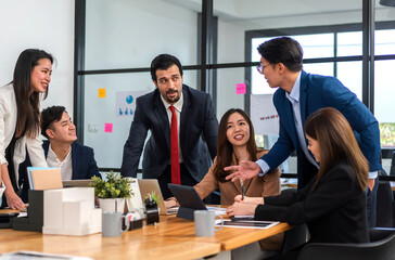 Group of creative asian business meeting and discussing strategy startup project analysis finance process.Success asian business people work plan and brainstorm marketing idea in office.Teamwork