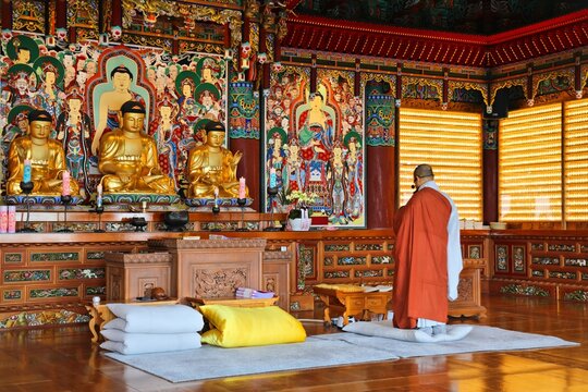 BUSAN, SOUTH KOREA - MARCH 29, 2023: Buddhist monk chants in Haedong Yonggungsa Temple in Busan, South Korea.