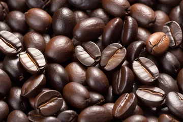 Gartenposter Roasted coffee beans background. Top view. Coffee background © Beyond Pixels