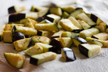 Drying Delights: Cubes of Eggplant on Wooden Board Close-Up