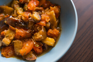 Soulful Comfort: Eggplant Stew in Blue Bowl Close-Up