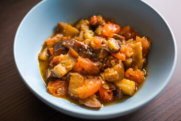 Soulful Comfort: Eggplant Stew in Blue Bowl Close-Up