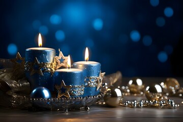 Elegantly placed small blue candles, gold stars and baubles., banner with space for your own content. Blue background color.