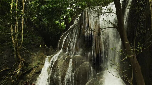aerial shot in waterfall from Sumbawa island, Indonesia. Drone view. Jungles and waterfall on a sunny day. Royalty-free stock footage