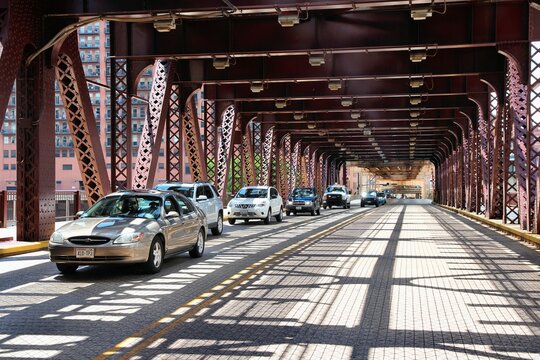 CHICAGO, USA - JUNE 26, 2013: Car traffic on Lake Street Bridge in Chicago. Chicago is the 3rd most populous US city with 2.7 million residents (8.7 million in its urban area).