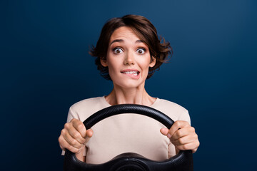 Photo portrait of pretty young girl nervous driving steering wheel wear trendy white outfit...