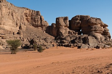 View of the Tadrart Rouge rocky mountain range in Tassili n Ajjer National Park. Sahara desert, Algeria, Africa.