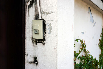 Old electronic bell on front door