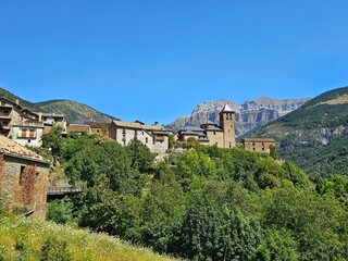 Fototapeta na wymiar Torla, a town in the Ordesa valley and Mount Lost, in the Pyrenees of Huesca