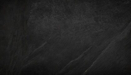 Black chalk board texture background.  Chalkboard, blackboard, school board  surface with scratches and chalk traces. Wide banner.