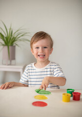 Caucasian Little Boy Painting with Colorful Hands Paints at Home Early Education Preparing for School Preschool Development Children Game