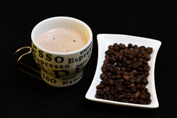 cup of coffee and coffee beans