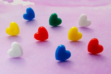 Hearts of different color looking for loving couple